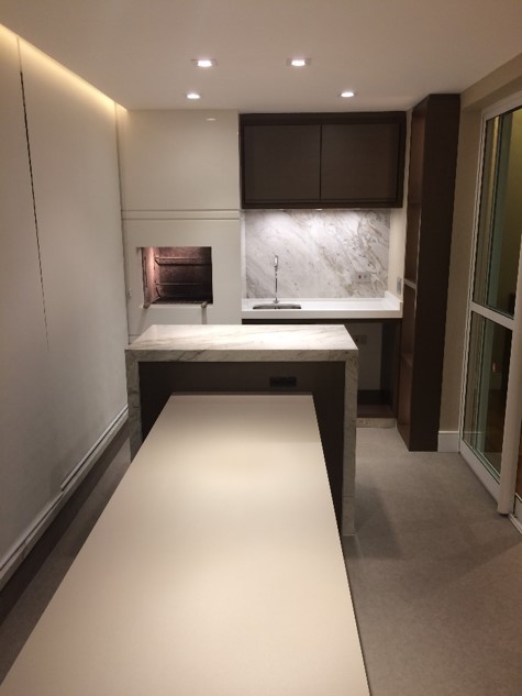 Kitchen with dark stone island